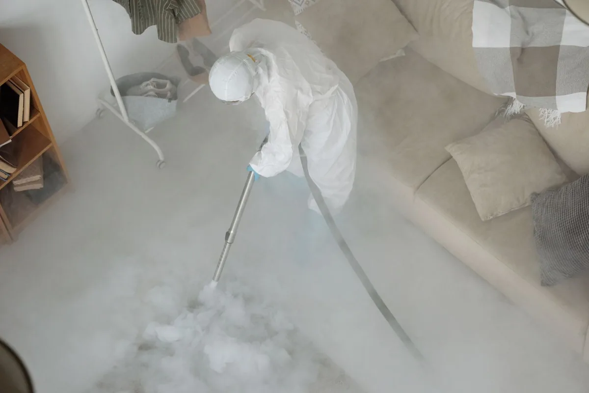 Biohazard cleanup technician in protective equipment, Pine Plains, NY
